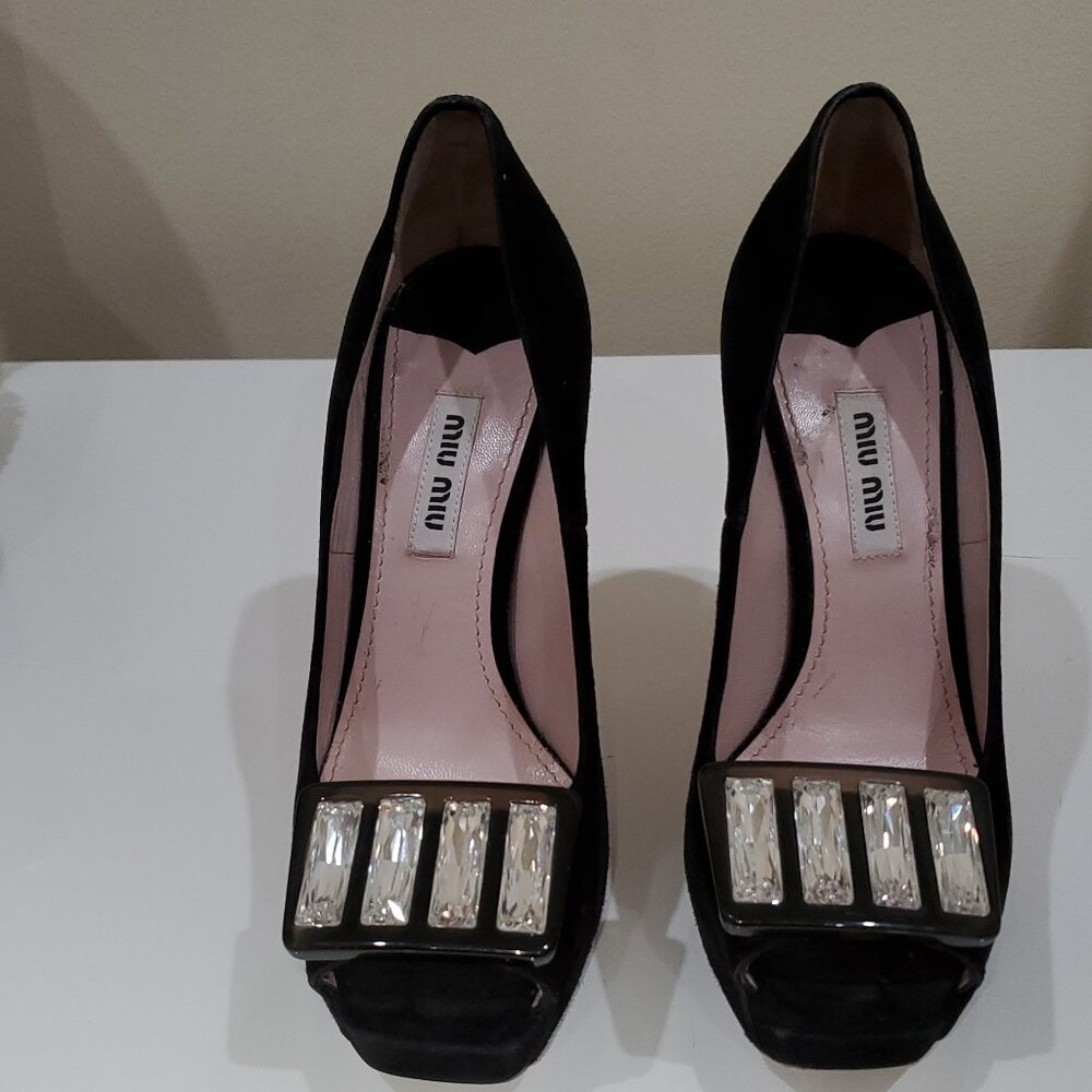 Designer Miu Miu black suede high heels shoes.